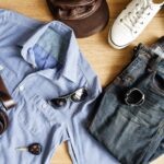 flat-lay-of-men-casual-fashion-outfits-on-wooden-b-P8XWEHX